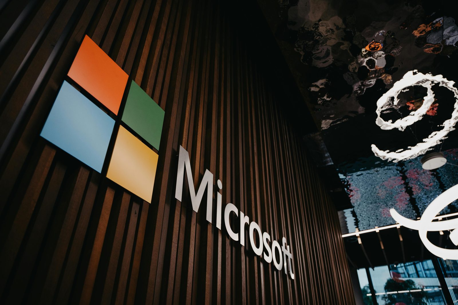 Microsoft branding on a wall, representing the Microsoft Dynamics 365 ecosystem